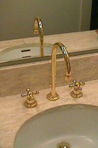 Raised Sinks and Faucets Help Bending Pain!